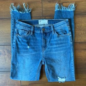 Free People distressed denim blue jeans fringe raw hem size 25 stretch